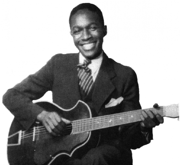 Josh White med sin aukustiske gitar, 1935