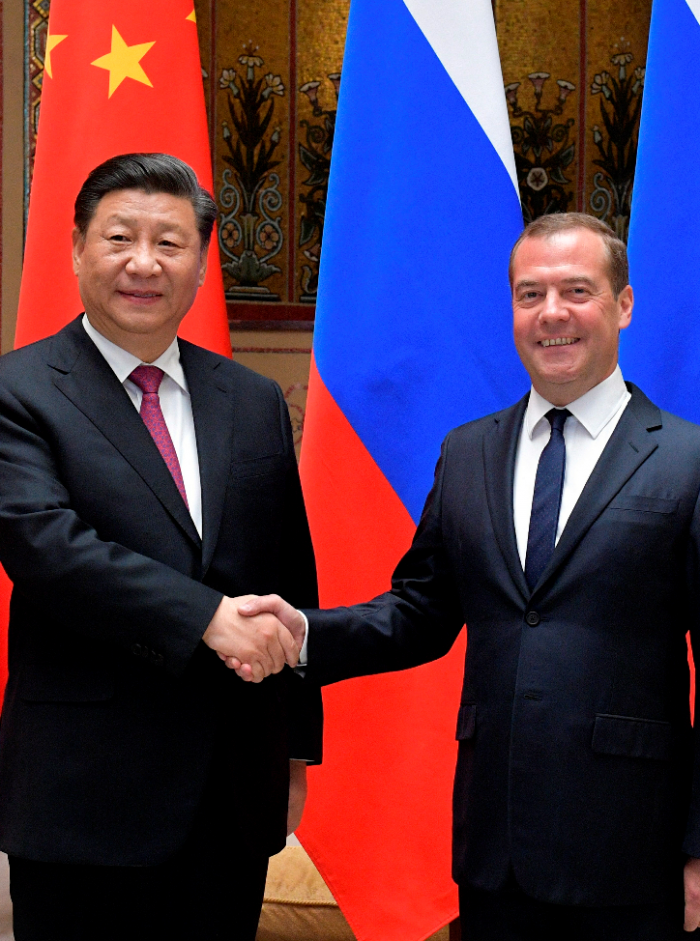 Kinas president Xi Jinping og russlands statsminister Dmitry Mededev			Alexander Astafyev, Sputnik, Government Pool Photo via A