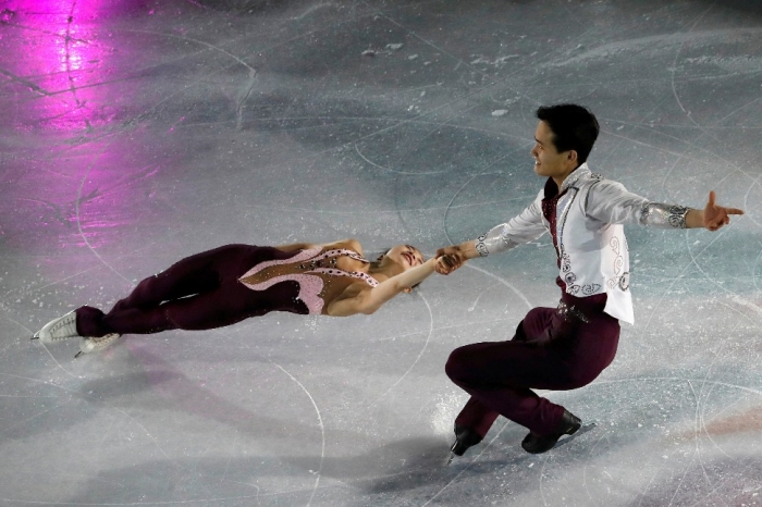 Til De olympiske leker: Ryom Tae Ok og Kim Ju Sik, nordkoreanske kunstløputøvere.													 REUTERS/Tyrone Siu